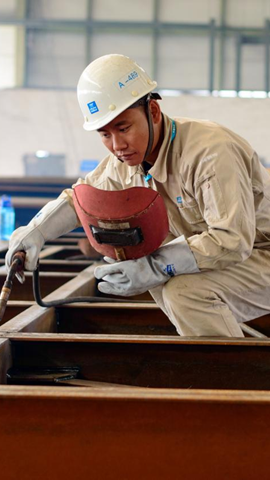 邱明輝：從學徒到鋼結構“焊將”